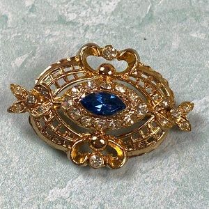 Vintage Coro brooch with blue center stone